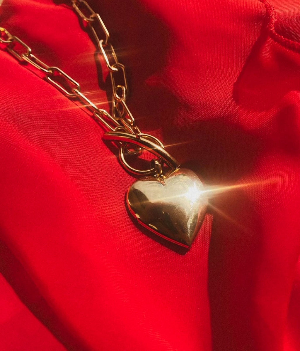 bijou en forme de coeur qui s'ouvre pour mettre une photo