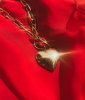 bijou en forme de coeur qui s'ouvre pour mettre une photo